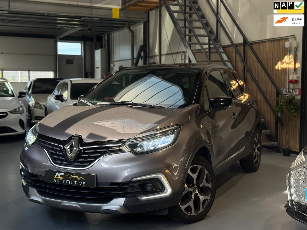 Renault Captur - 0.9 TCe Intens R-link Navi/Xenon/Nap - AutoWereld.nl