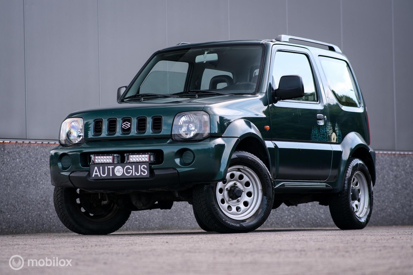 Suzuki Jimny - 1.3 JLX 4x4 | LED | 4 persoons | Nieuwe koppeling | Trekhaak | AWD | Harde auto | inruil m - AutoWereld.nl