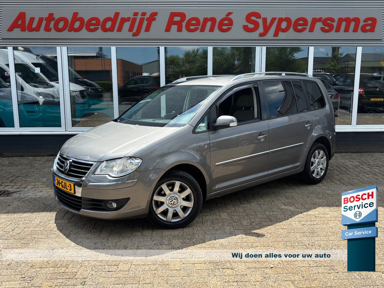 Volkswagen Touran - 1.4 TSI Highline Business | Automaat | Trekhaak | Navi | Cruise | Airco - AutoWereld.nl