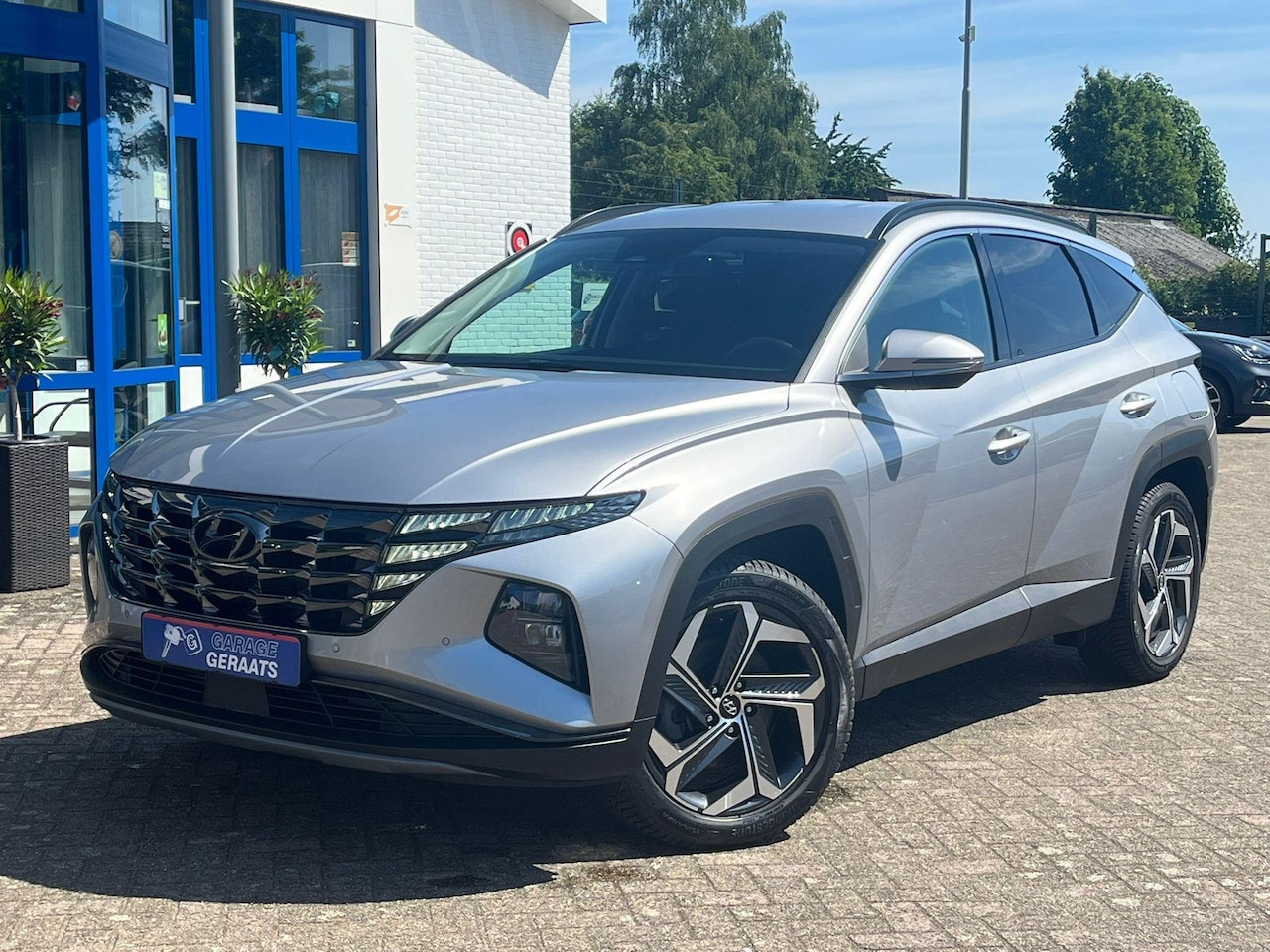 Hyundai Tucson - 1.6 T-GDI PHEV Comfort Smart 4WD l Elektr. achterklep, Stoel- en stuurverwarming, Parkeers - AutoWereld.nl