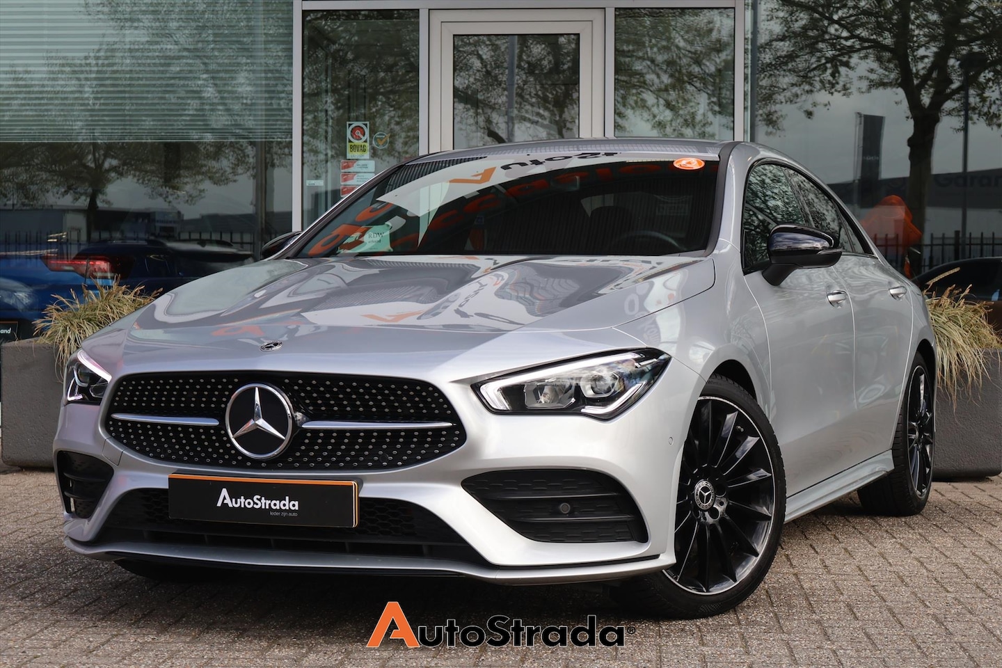 Mercedes-Benz CLA-Klasse - Coupé 180 AMG-Line 136pk | Carplay | Cruise | Climate | Navigatie | Sfeer | Stoelverwarmin - AutoWereld.nl