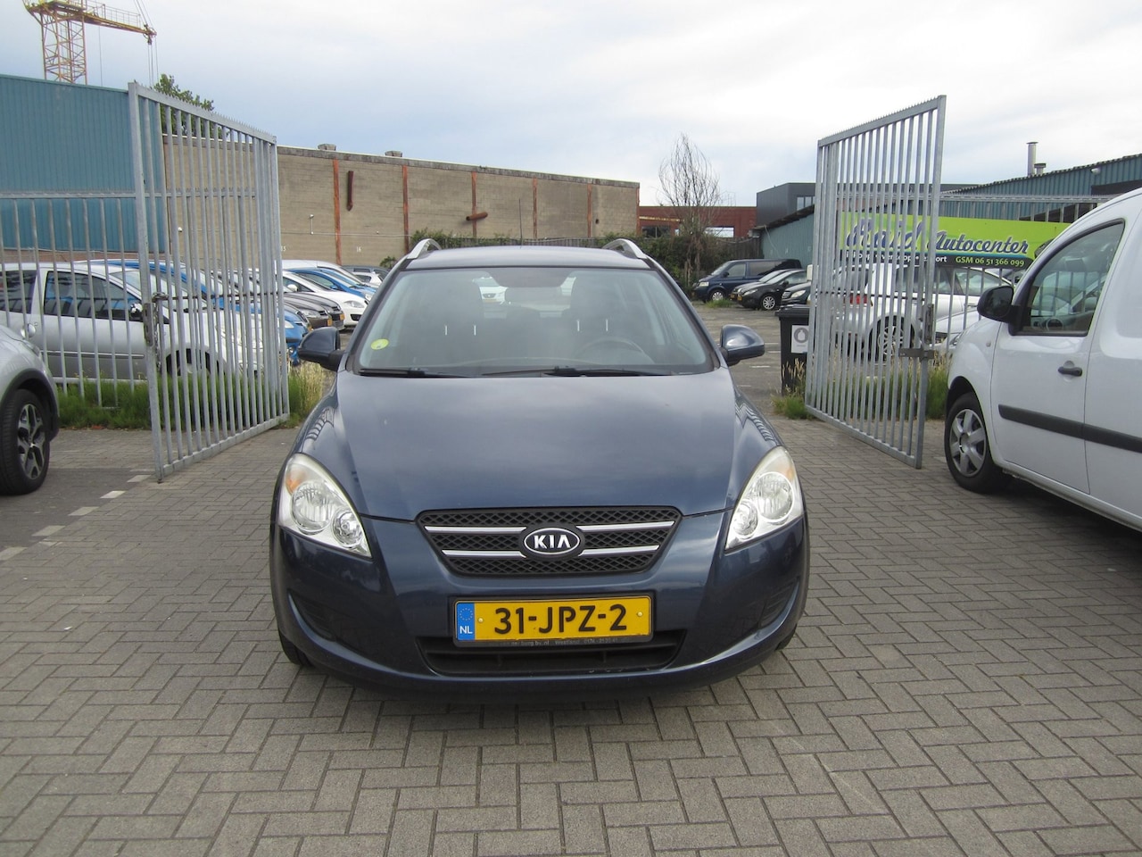 Kia Cee'd Sporty Wagon - 1.4 CVVT X-tra 1.4 CVVT X-tra - AutoWereld.nl