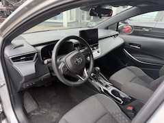 Toyota Corolla Touring Sports - 1.8 HYBRID 140PK SILVERLINE ACTIVE GARANTIE 2034 . NAVIGATIE . ADAPTIEVE CRUISE CONTROLE .