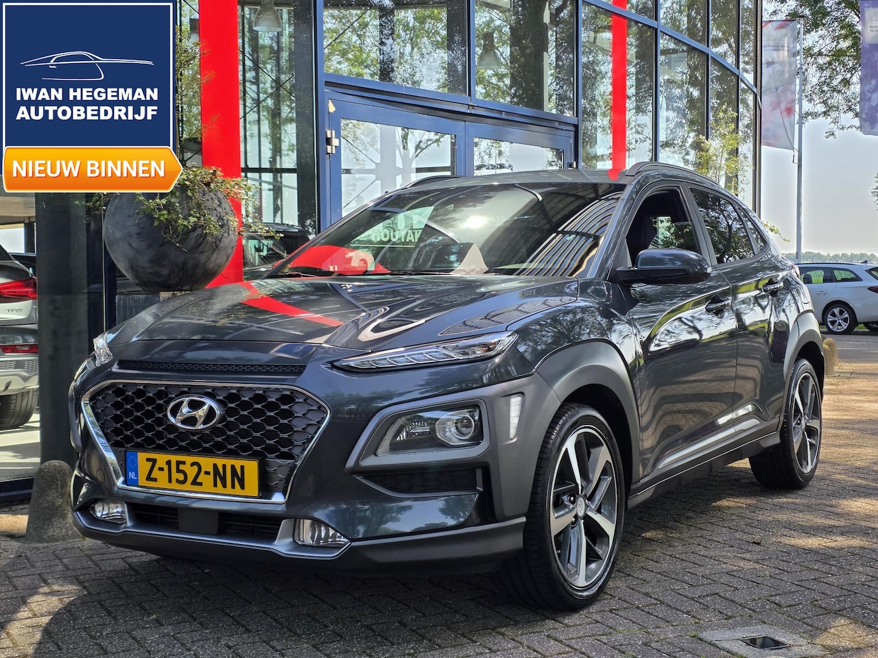 Hyundai Kona - 1.0T Comfort | Navigatie via Apple Carplay | Climate Control | Parkeersensoren + Camera | - AutoWereld.nl