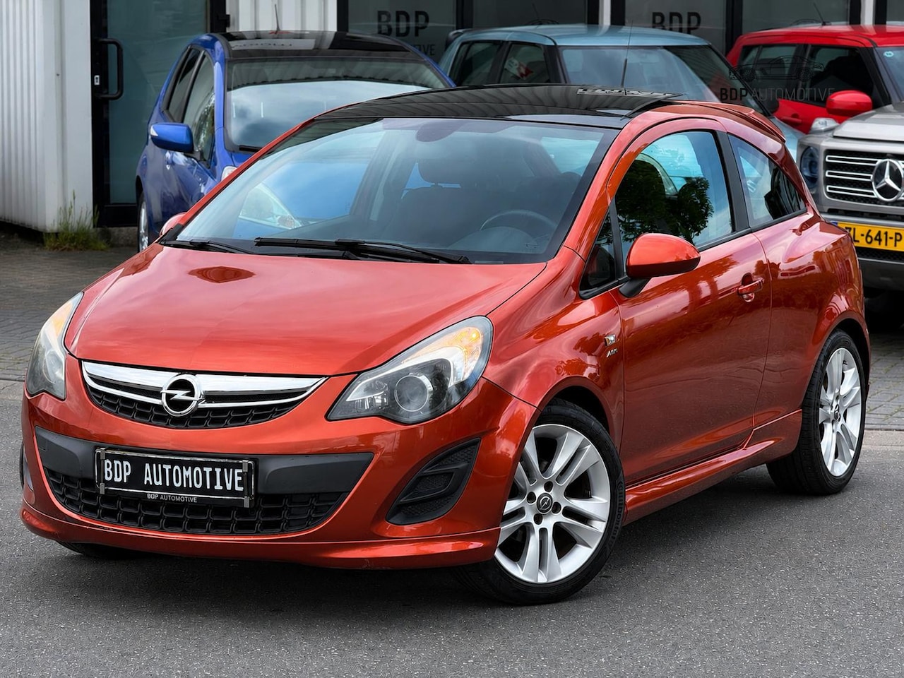 Opel Corsa - 1.4-16V Cosmo 1ste Eigenaar | Pano | OPC Pakket | APK nieuw bij aflevering - AutoWereld.nl