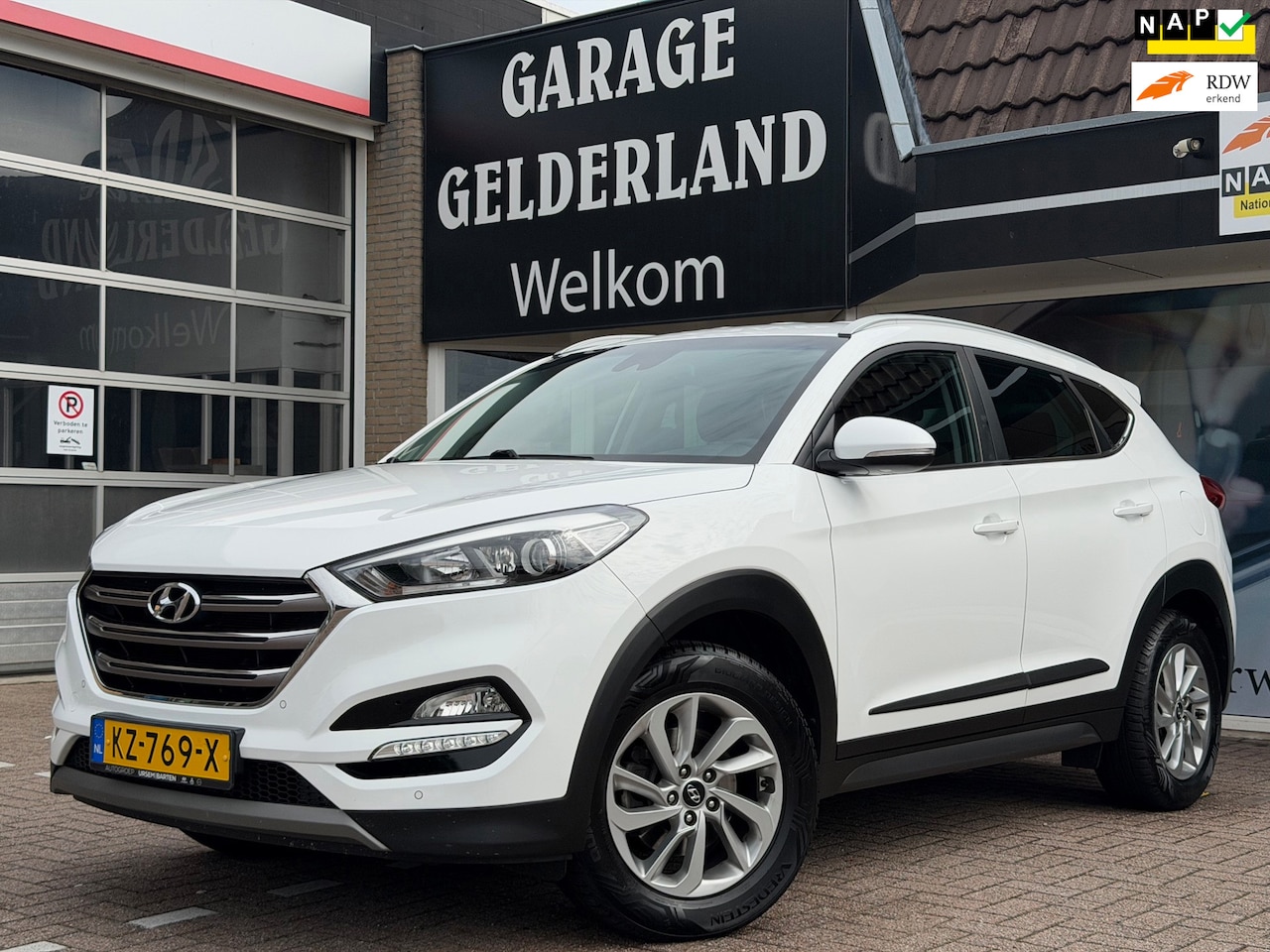 Hyundai Tucson - 1.6 | Navi | Camera | Trekhaak | Stoelverw. | Climate | Cruise | Pdc | Isofix | Full-optio - AutoWereld.nl