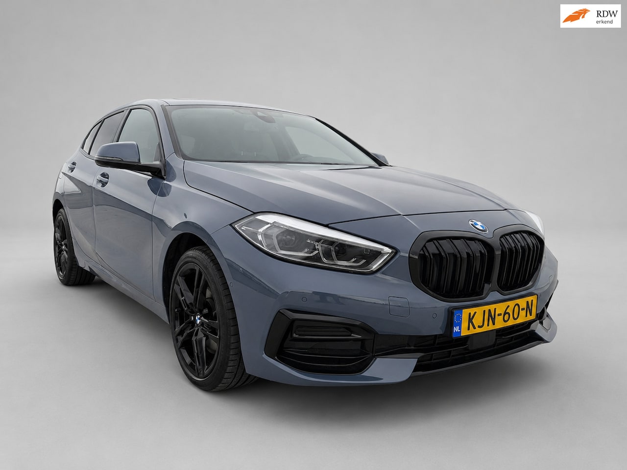 BMW 1-serie - 118i - Panoramadak - Memorystoel - Stoelverwarming - Adapt Cruise - Camera - CarPlay - Inc - AutoWereld.nl