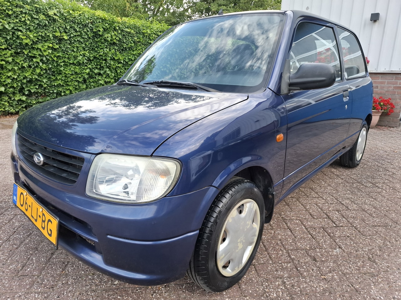 Daihatsu Cuore - 1.0-12V DVVT XTi AUTOMAAT NIEUWE APK 58PK - AutoWereld.nl