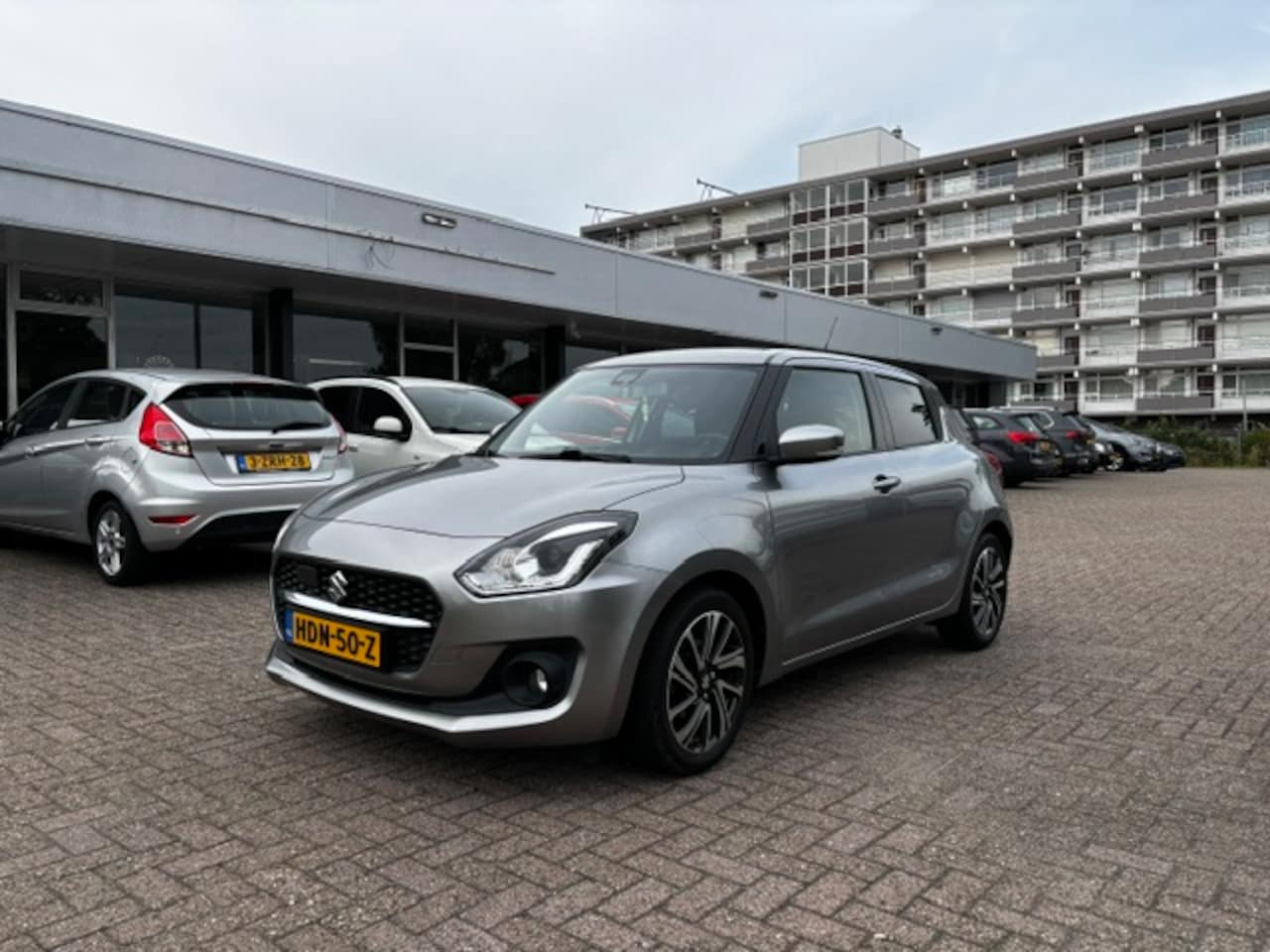 Suzuki Swift - 1.2 Style Smart Hybrid Acamera Cruise Navi Lmv Pdc - AutoWereld.nl