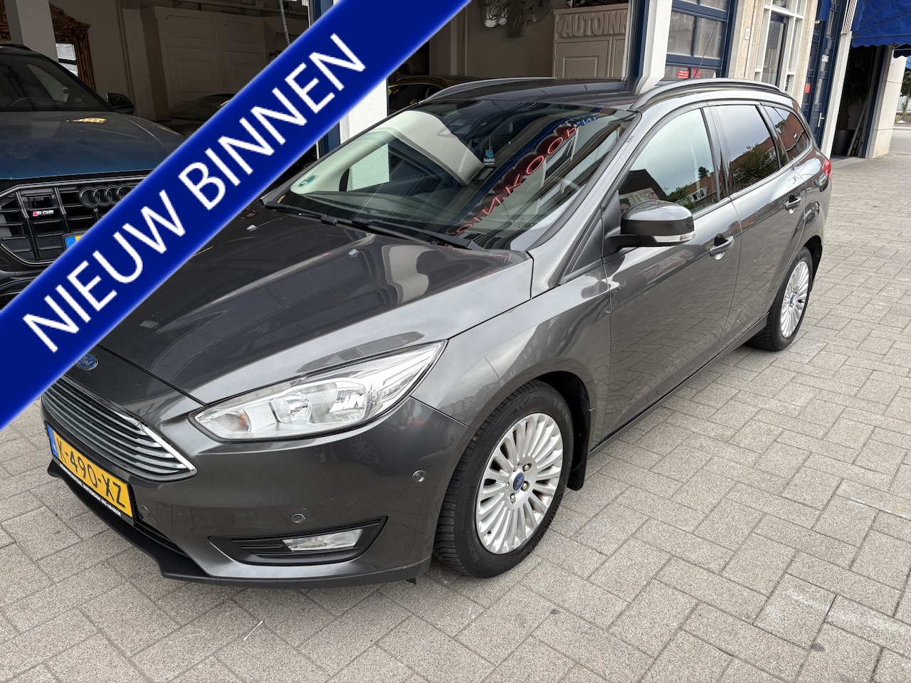 Ford Focus Wagon - 1.0 Titanium Edition CLIMA/NAVI/CRUISE/4NW BANDEN/NW APK - AutoWereld.nl