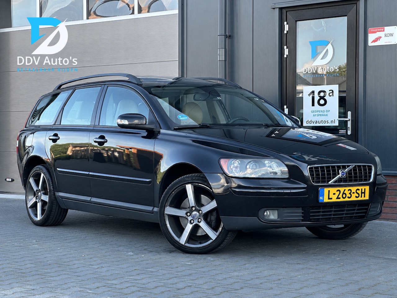 Volvo V50 - 2.5 T5/221pk AWD Summum|Cruise|Dakje|Leder|PDC|Elek. Stoel met Memory|Stoelverwarming|Xeno - AutoWereld.nl