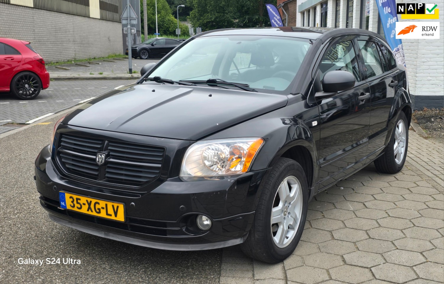 Dodge Caliber - 2.0 SXT*automaat*lage km 101000 nap*apk*airco*trekhaak*navi*leer*inruil mog!!! - AutoWereld.nl