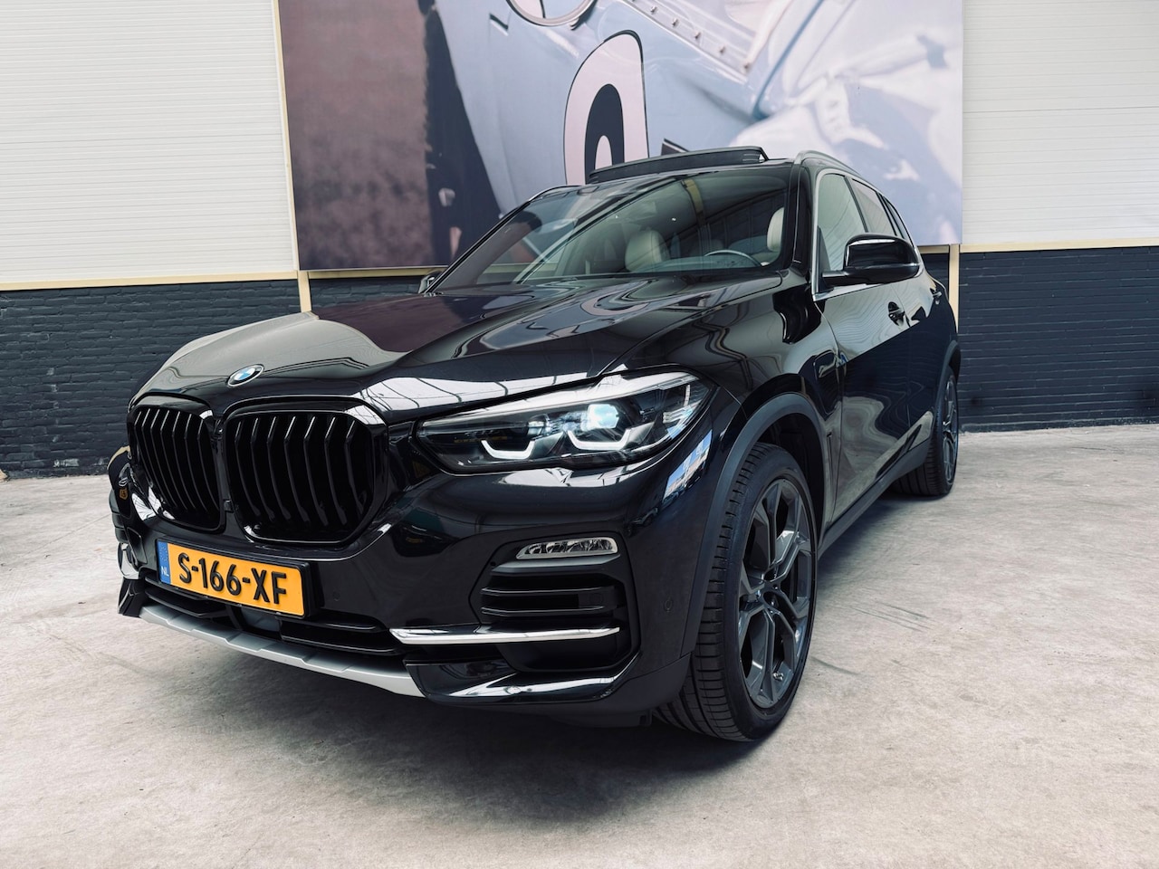 BMW X5 - XDrive45e|PANO|H&K|TREKHAAK|21INCH|CAMERA| - AutoWereld.nl