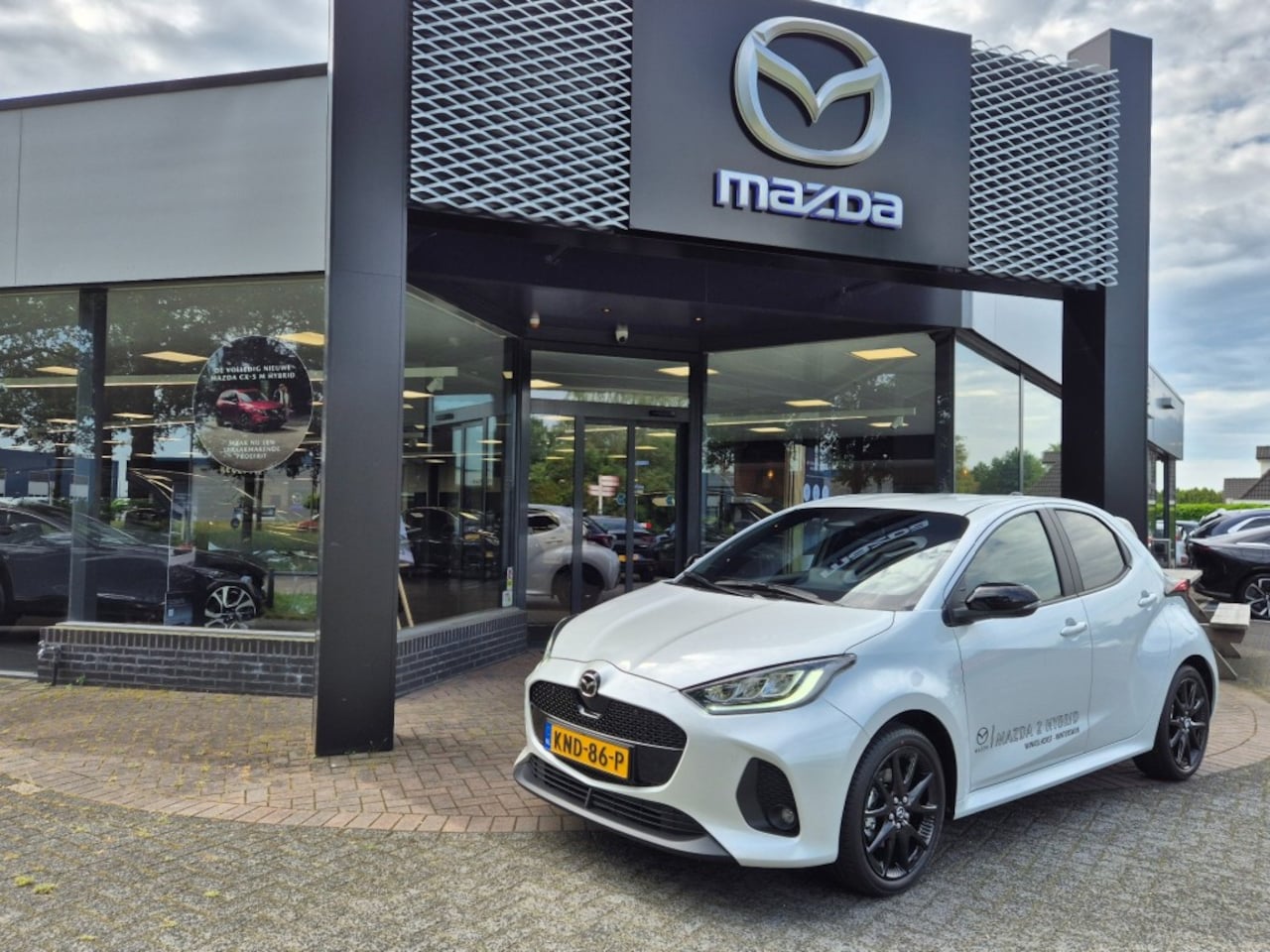 Mazda 2 Hybrid - 2 HYBRID VVT-i 1.5 116 HOMURA / Demo - AutoWereld.nl