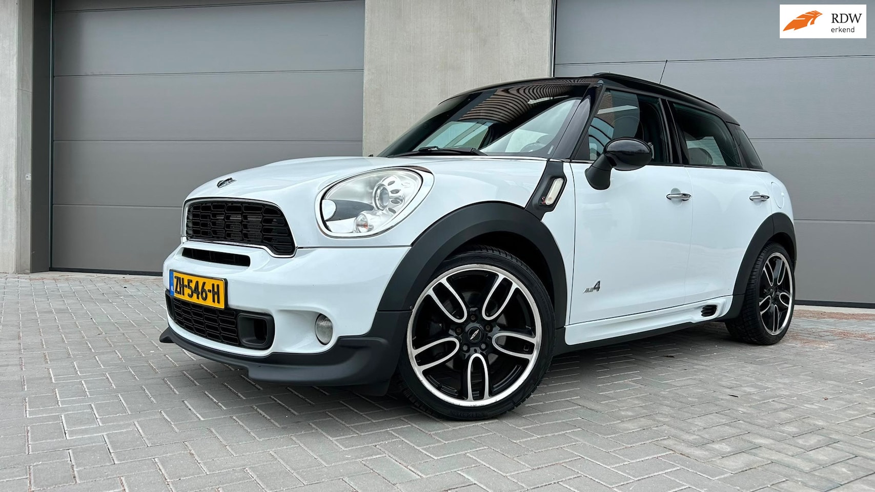 MINI Countryman - 1.6 Cooper S ALL4 JCW/LEDER/PANORAMADAK/NAVIGATIE/HARMAN KARDON/BOMVOL/HISTORIE AANWEZIG/N - AutoWereld.nl
