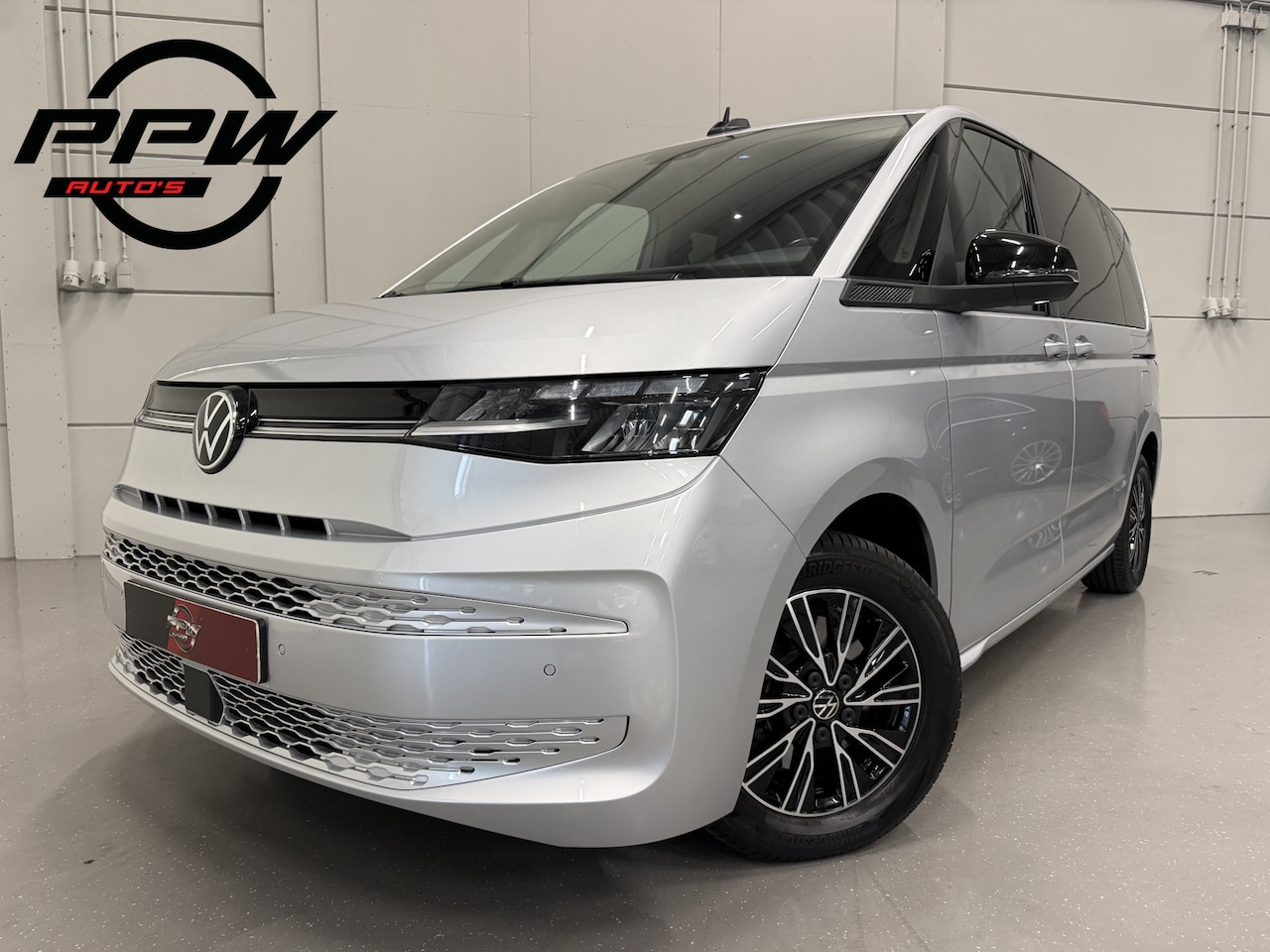 Volkswagen Multivan - 1.4 eHybrid Life 7p. TREKHAAK/ACC/CAMERA/ELECTR.SCHUIFDEUREN/17"/CARPLAY/STOEL+STUURVERW/E - AutoWereld.nl