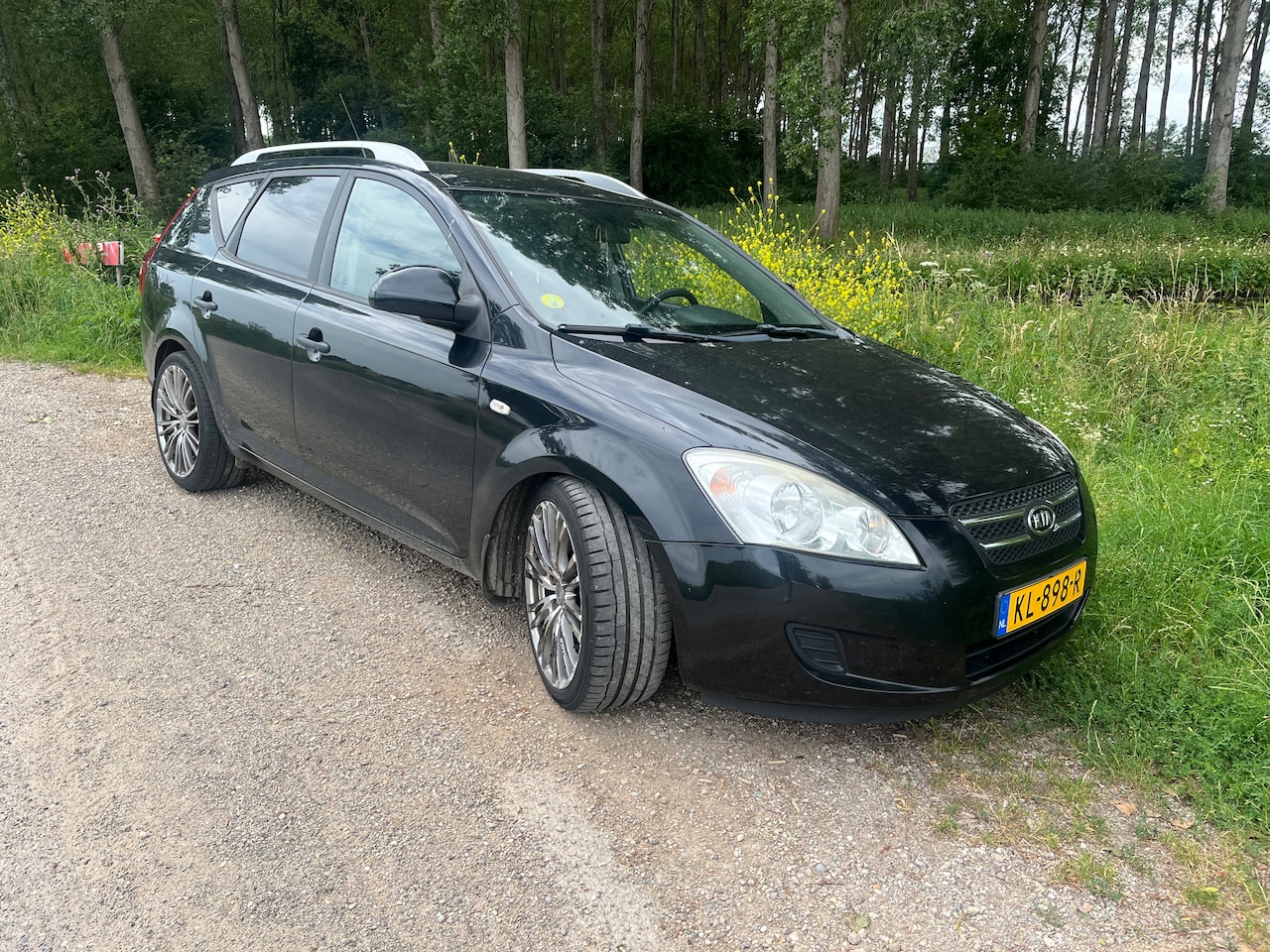 Kia Cee'd Sporty Wagon - 1.6 X-tra - AutoWereld.nl