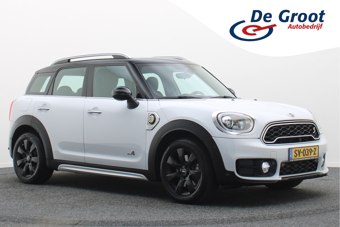 MINI Countryman - 1.5 Cooper S E ALL4 Plug-in Hybrid JCW-Pakket, Climate, Stoelverwarming, LED, Cruise, Blue - AutoWereld.nl