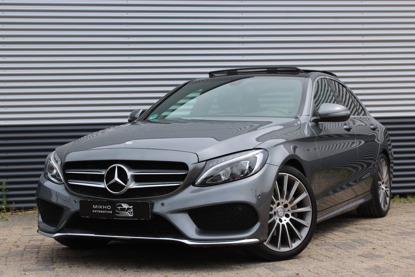Mercedes-Benz C-klasse - 180 AMG | Panoramadak | Memory Seats | Camera | Cruise control | NAP | - AutoWereld.nl