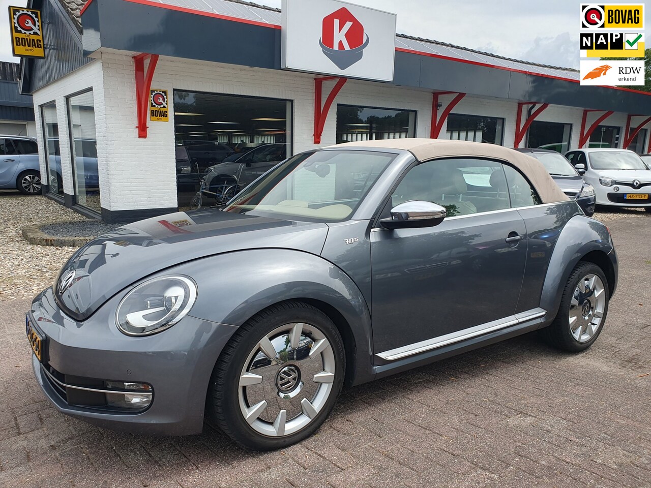 Volkswagen Beetle Cabriolet - 1.4 TSI 70S LEER/NAVI/PDC - AutoWereld.nl