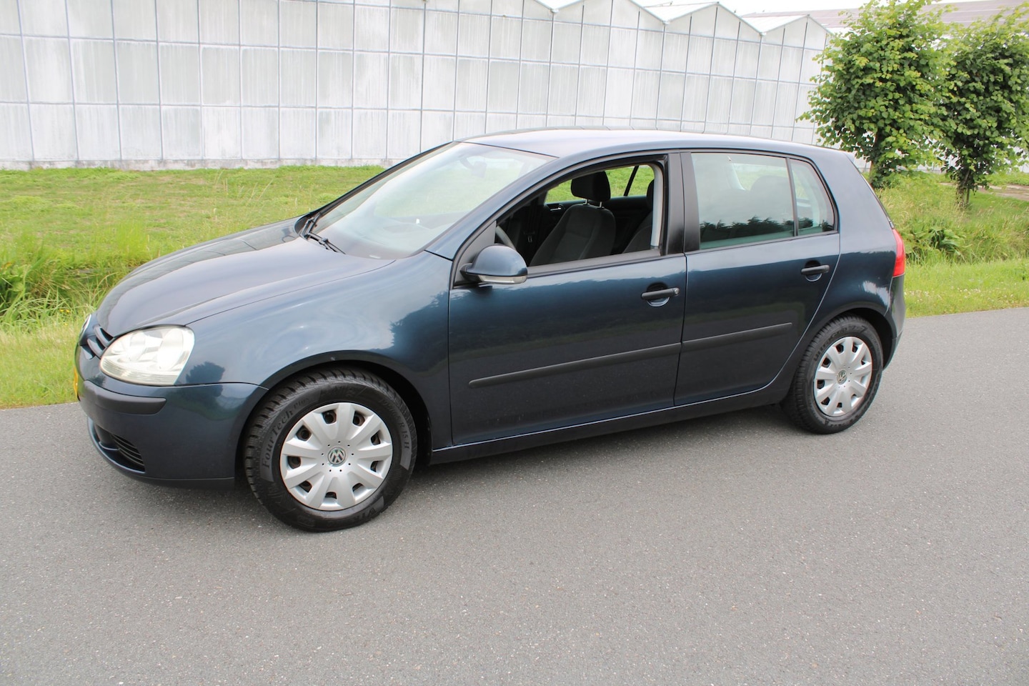 Volkswagen Golf - 1.6 FSI Comfortline 5 Drs met Airco - AutoWereld.nl