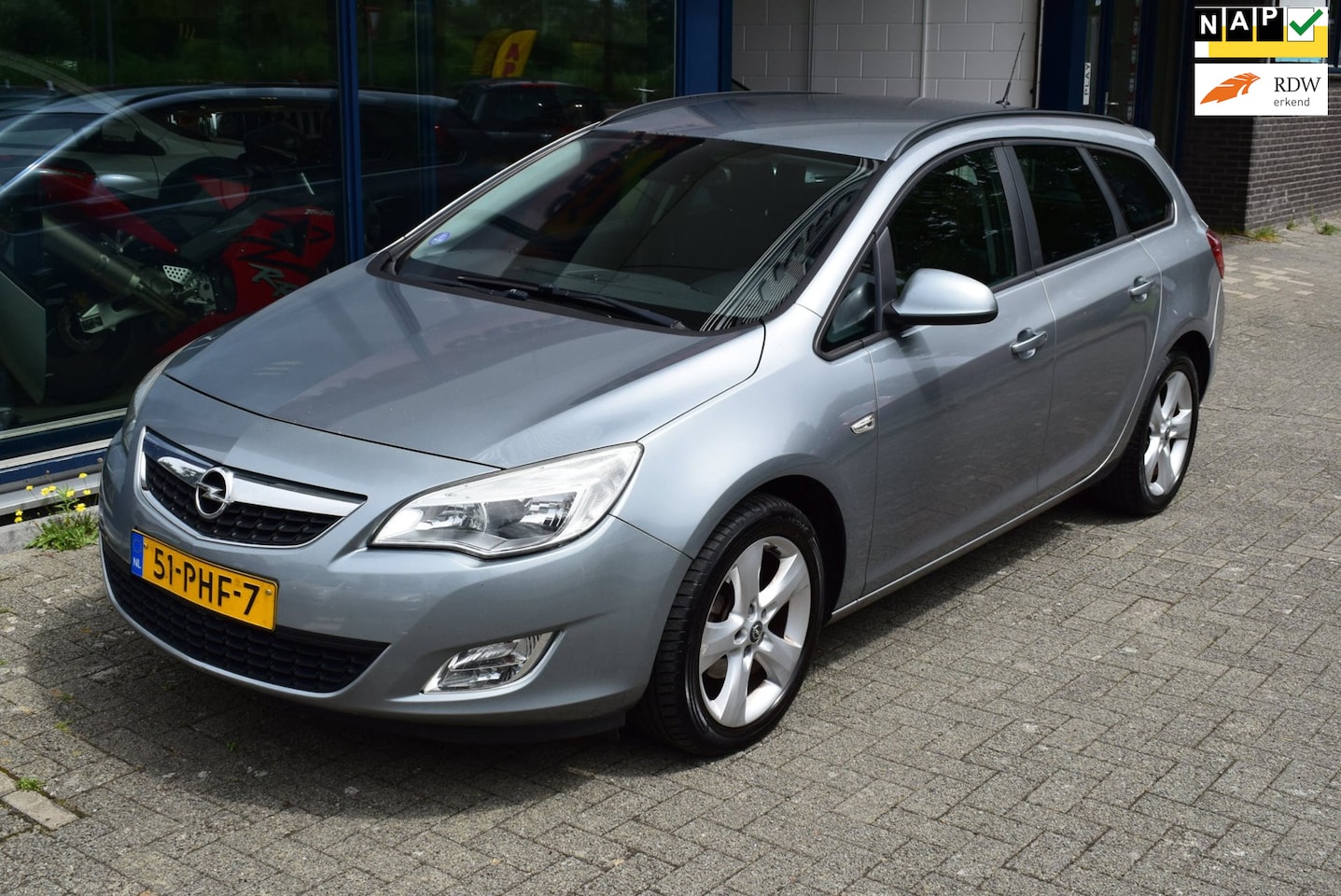 Opel Astra Sports Tourer - 1.4 Turbo Edition airco - Airco, Trekhaak - AutoWereld.nl