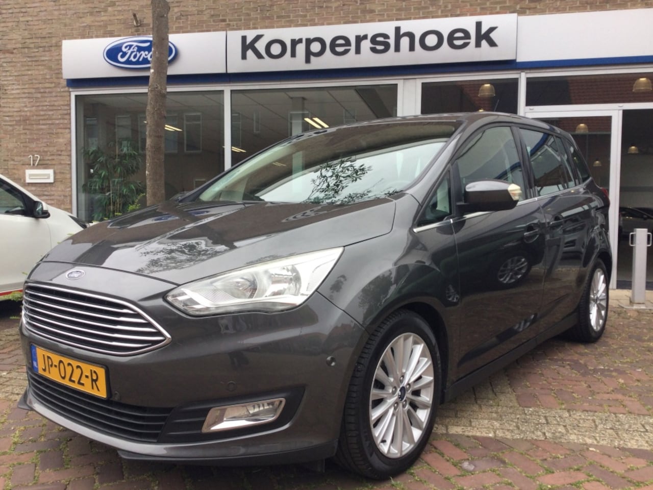 Ford Grand C-Max - 1.0 125 pk Titanium | Trekhaak | Nw. distributieriem - AutoWereld.nl