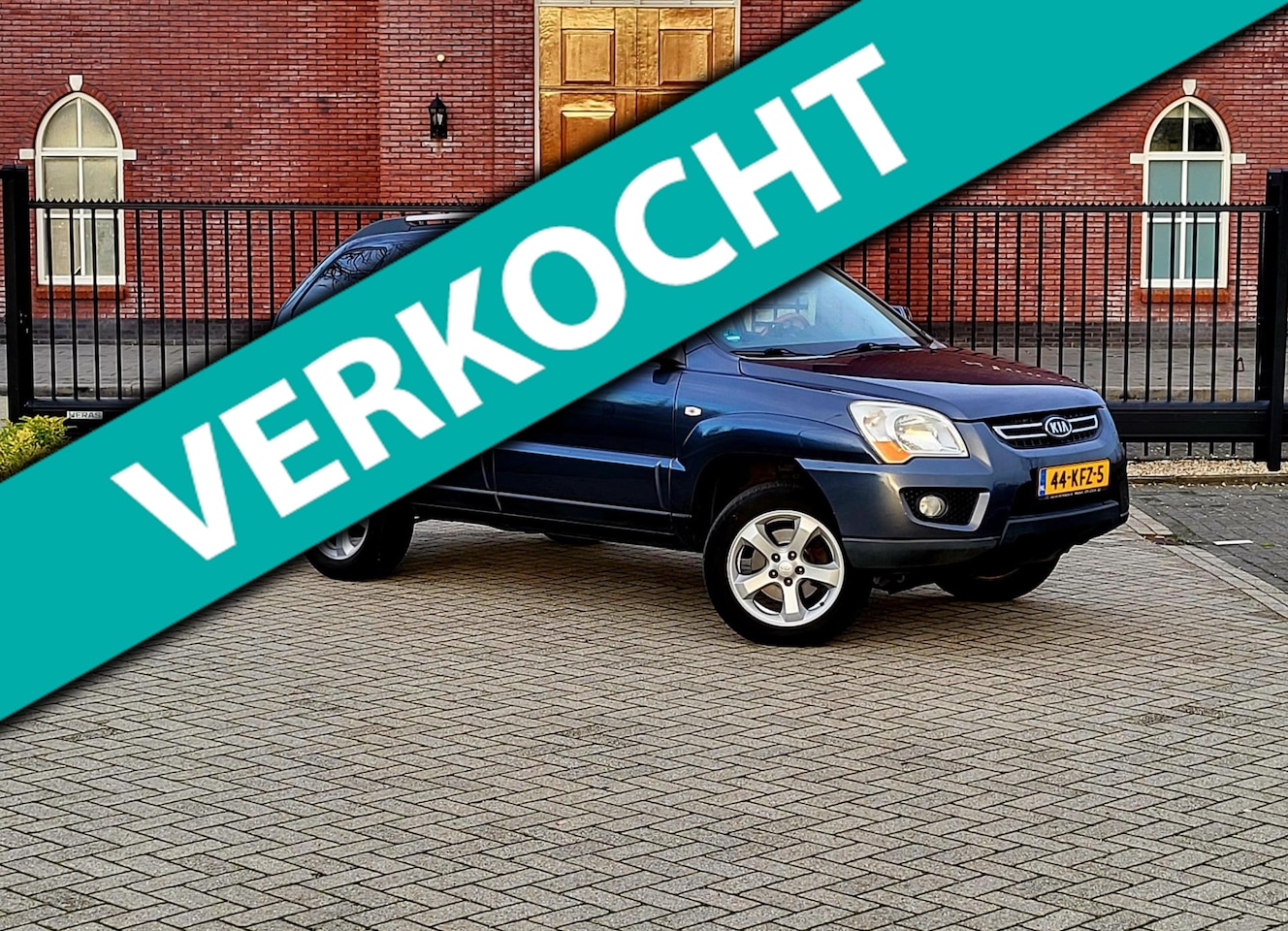 Kia Sportage - 2.0 CVVT Fifteen / Airco / Cruise control / Stoelverwarming / Open dak - AutoWereld.nl