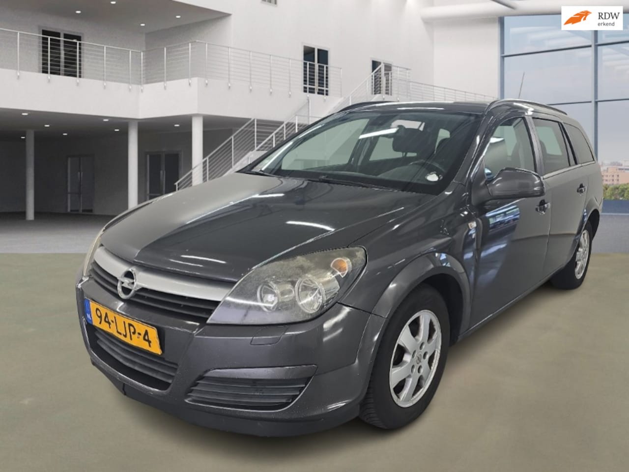 Opel Astra Wagon - 1.6 111 years Edition/AIRCO/CRUISE/PARKEERSENSOR/TREKHAAK - AutoWereld.nl