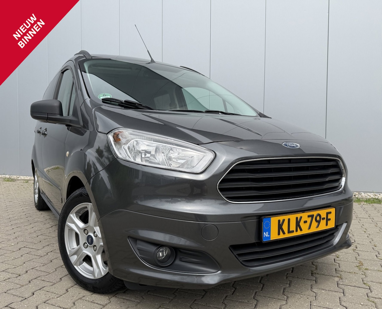 Ford Tourneo Courier - 1.0 Titanium 101PK 2016 Cruise | Trekhaak - AutoWereld.nl
