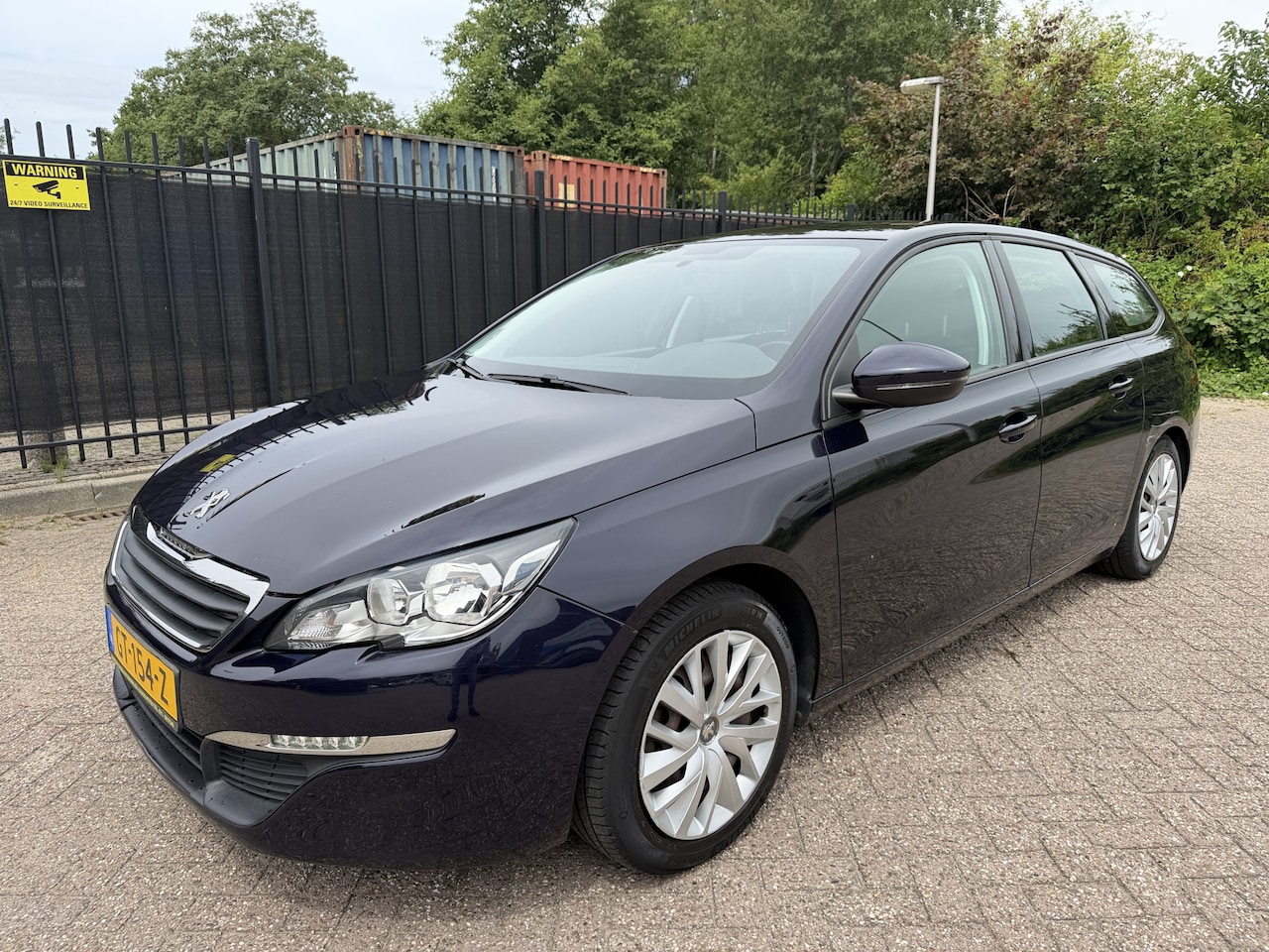 Peugeot 308 SW - 1.2 PureTech Blue Lease Navi/Clima/Cruise/PDC/Trekhaak - AutoWereld.nl