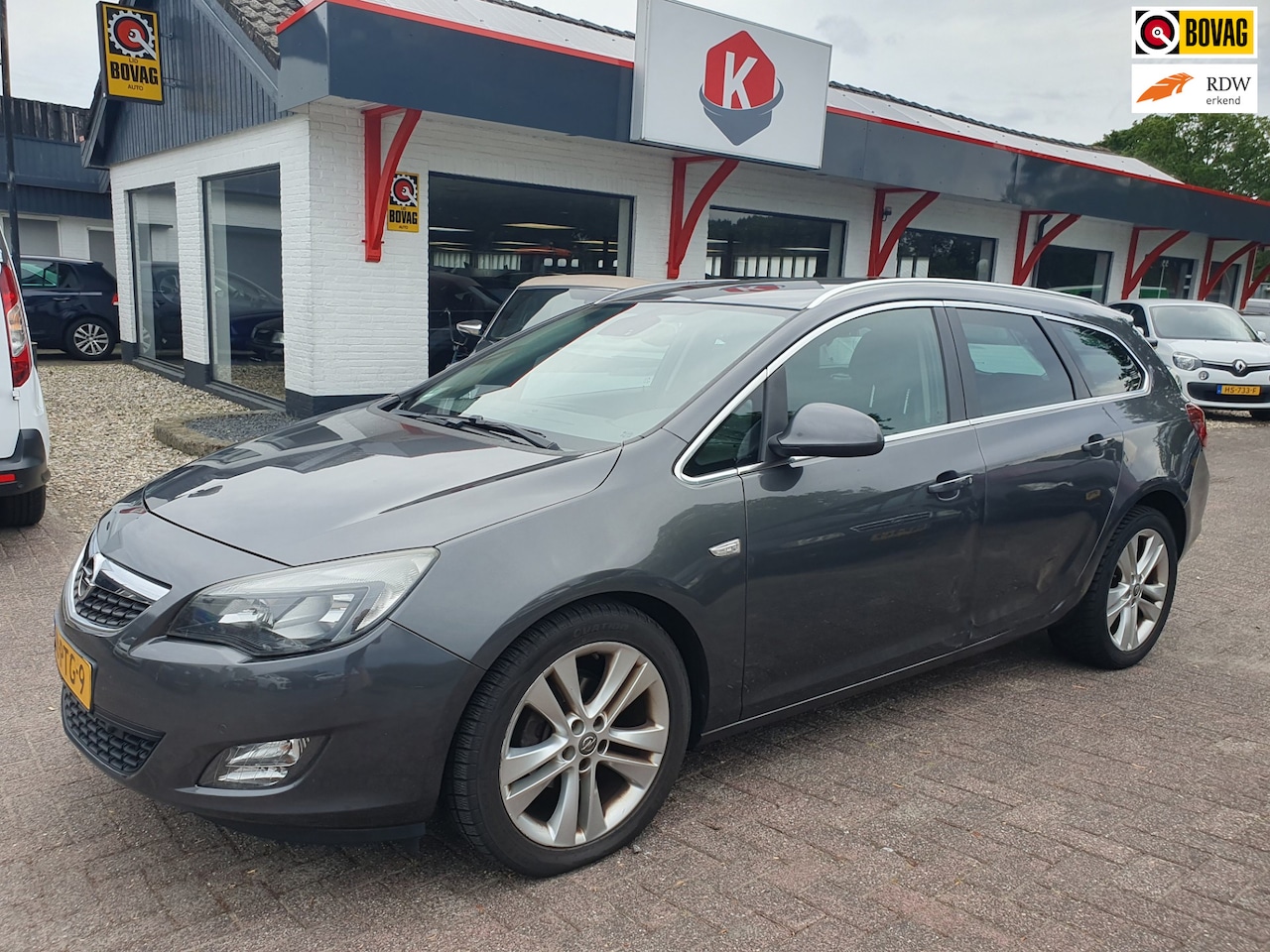 Opel Astra Sports Tourer - 1.4 Turbo Sport LEER/AIRCO BJ 2011 - AutoWereld.nl