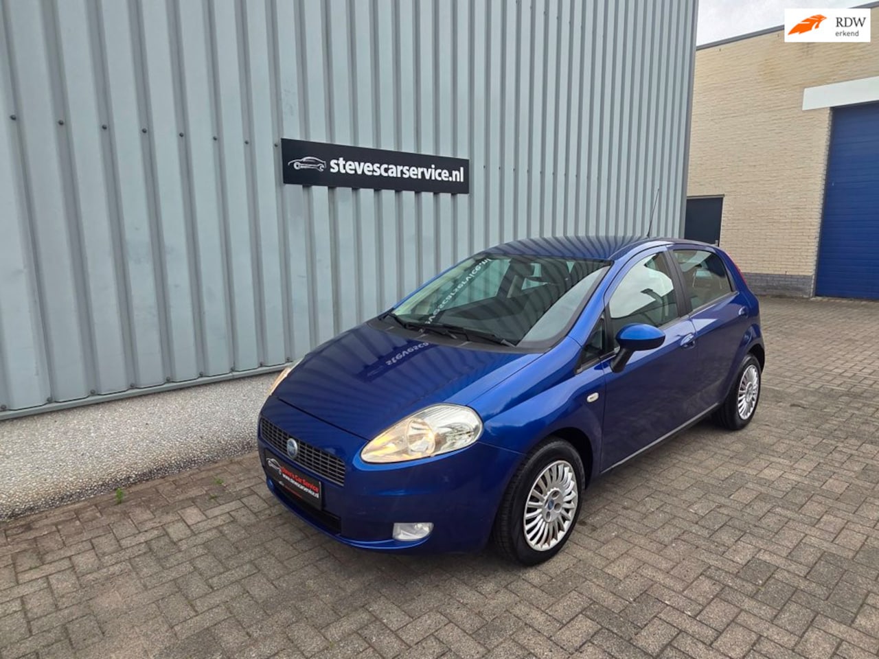 Fiat Grande Punto - 1.4 Edizione Prima komt met nieuwe apk - AutoWereld.nl