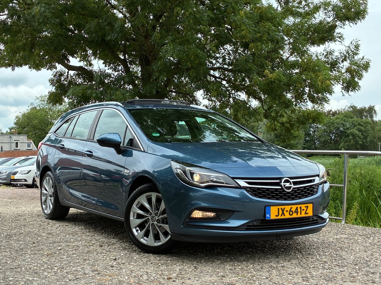 Opel Astra Sports Tourer - 1.0 Edition | Schuif/kantel dak + Clima + Cruise + Navi nu € 5.975,-!!! - AutoWereld.nl