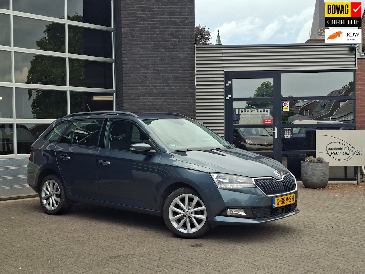 Skoda Fabia Combi - 1.0 TSI 70 KW Business Edition | Afneembare trekhaak | Parkeersensoren | Navigatie | Cruis - AutoWereld.nl