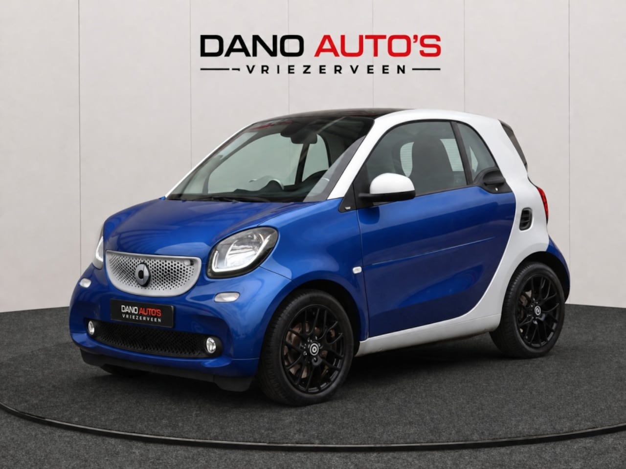 Smart Fortwo - 1.0 Prime Leer/Pano/PDC/16''/Airco/Cruise - AutoWereld.nl