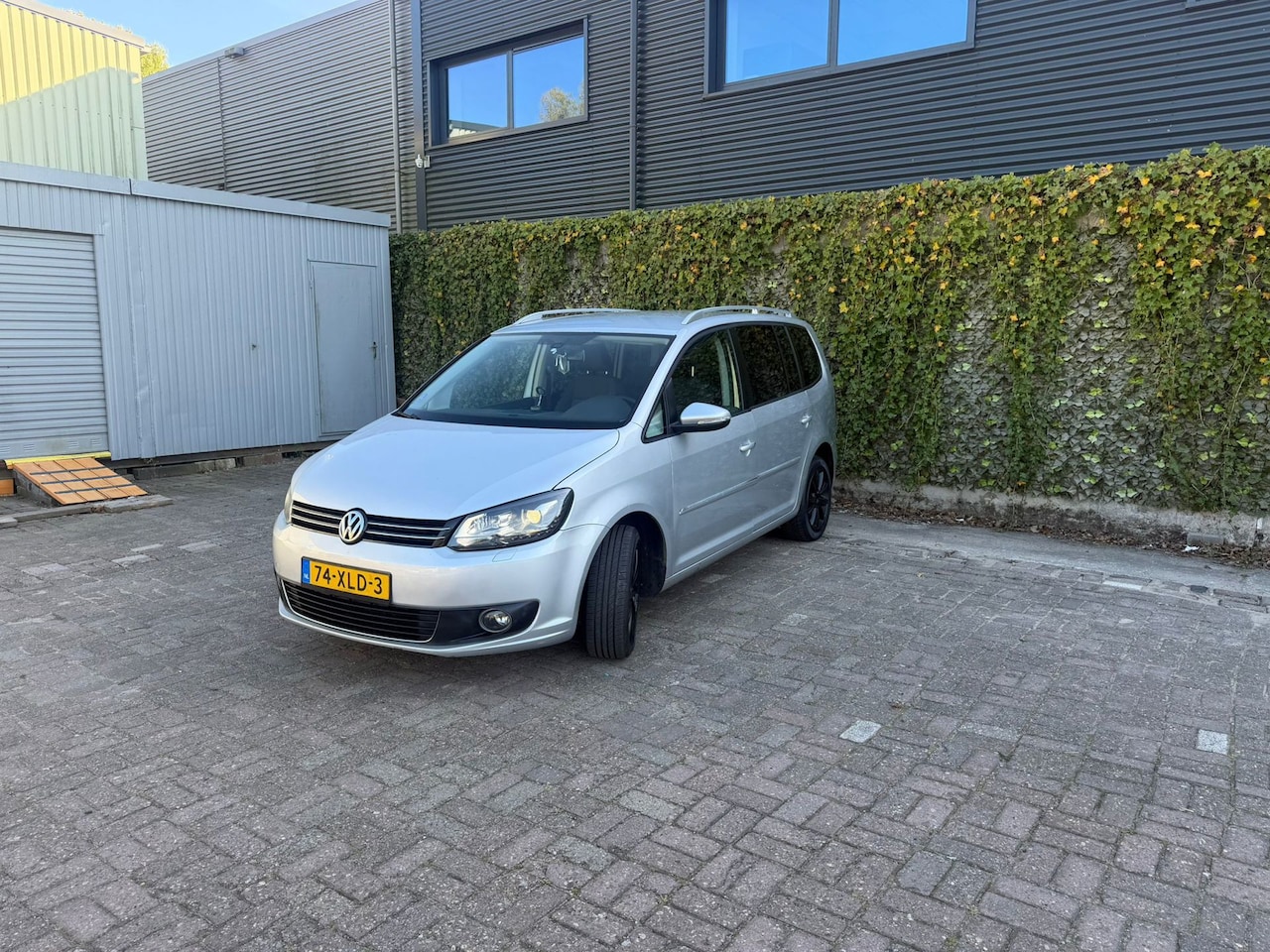 Volkswagen Touran - 1.2 TSI Highline BlueMotion 7p. 1.2 TSI Highline BlueMotion 7p. - AutoWereld.nl