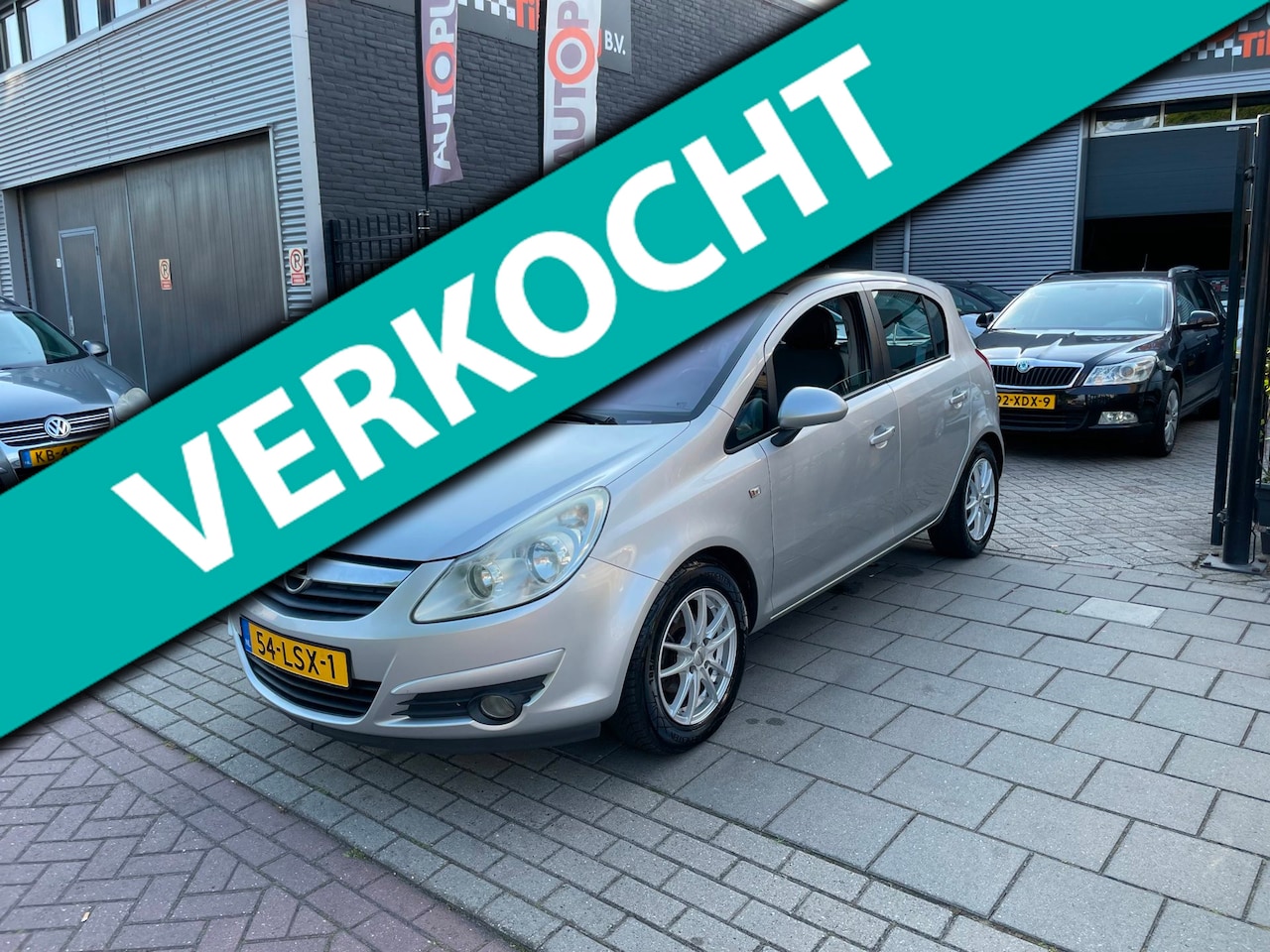 Opel Corsa - 1.4-16V Cosmo 3e Eigenaar! Airco PDC NAP APK - AutoWereld.nl