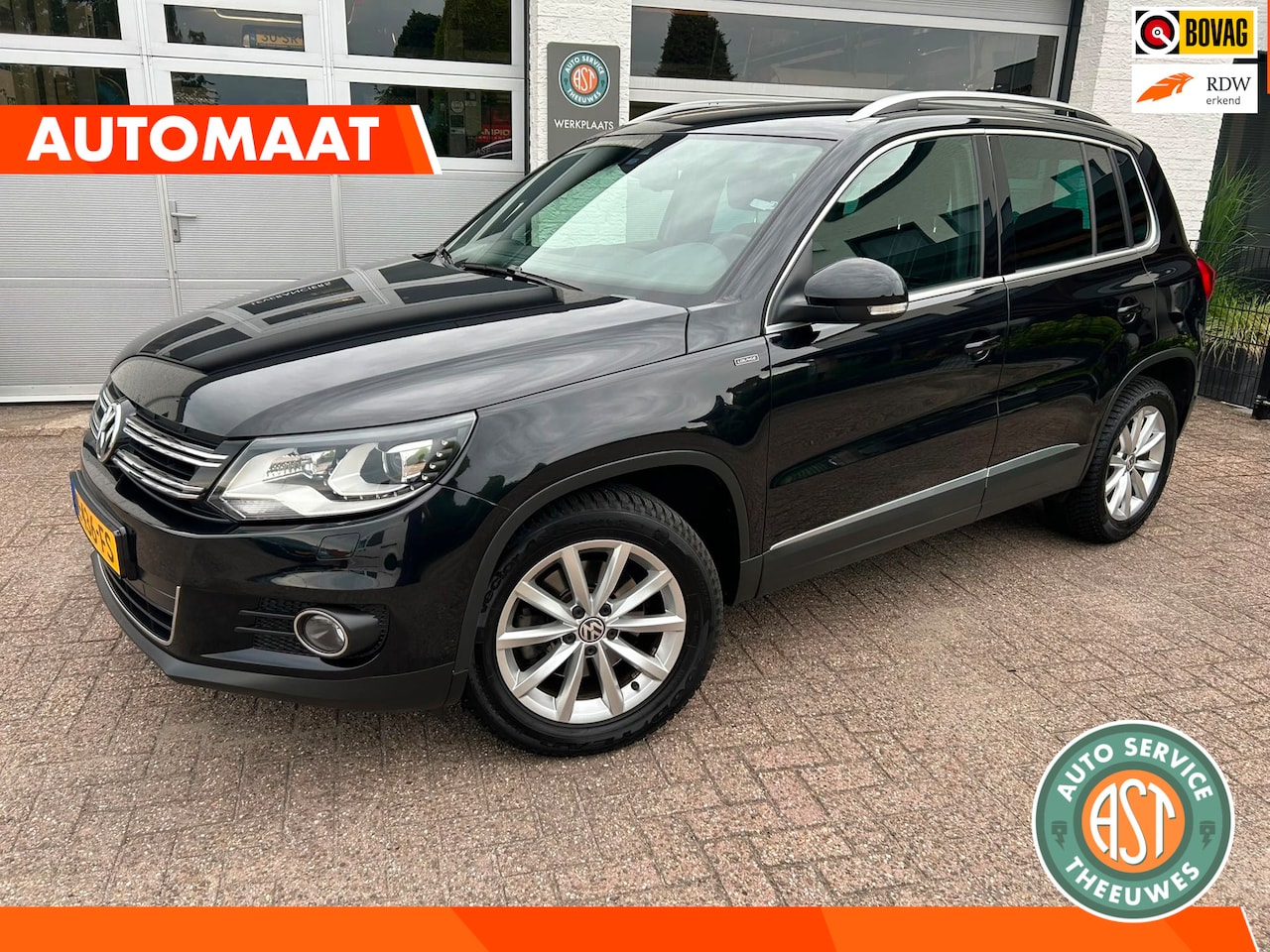 Volkswagen Tiguan - 1.4 TSI LOUNGE AUTOMAAT|NAVI|CAMERA|STOELVERW.|CRUISE - AutoWereld.nl