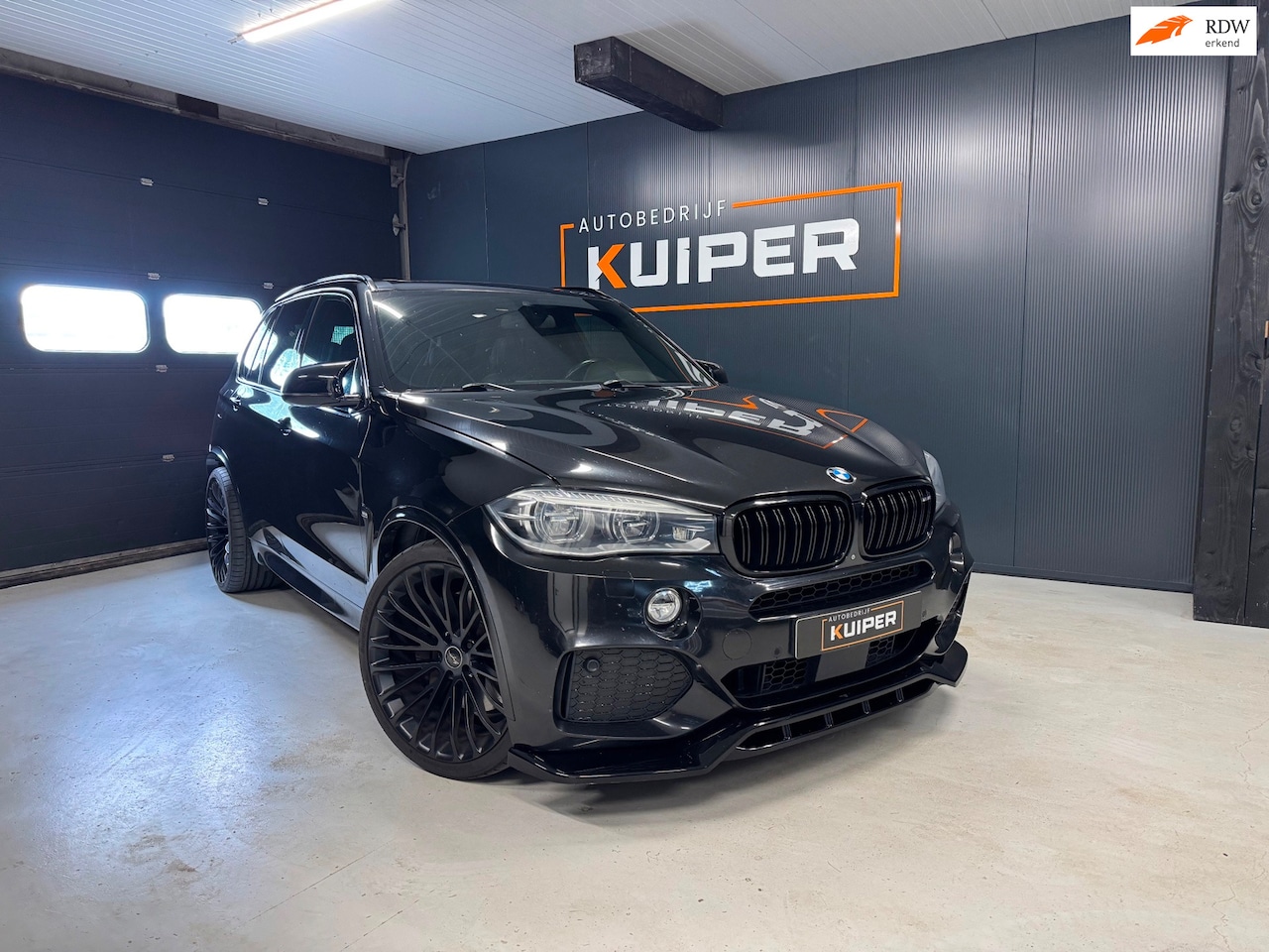BMW X5 - M50d Compleet M Pano Black edition - AutoWereld.nl