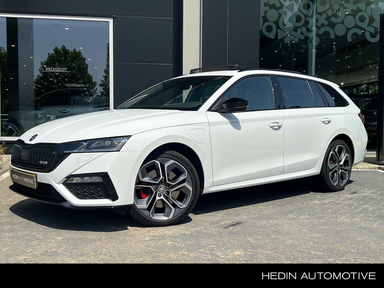 Skoda Octavia Combi - 1.4 TSI RS iV PHEV Business | Kantel/schuif dak | Elek achterklep | Matrix lampen - AutoWereld.nl