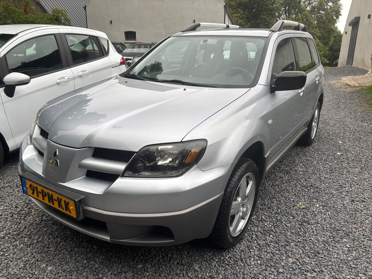 Mitsubishi Outlander Sport - 2.0 4WD KM 163747 MET NAP - AutoWereld.nl