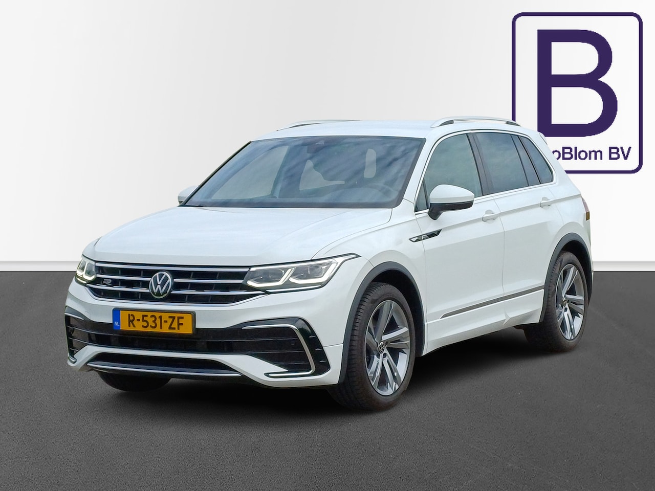 Volkswagen Tiguan - 1.5 TSI R-Line Business+ /Prachtige auto!/Trekh./Digi Dash/Camera/Carplay/Led/19"/ - AutoWereld.nl