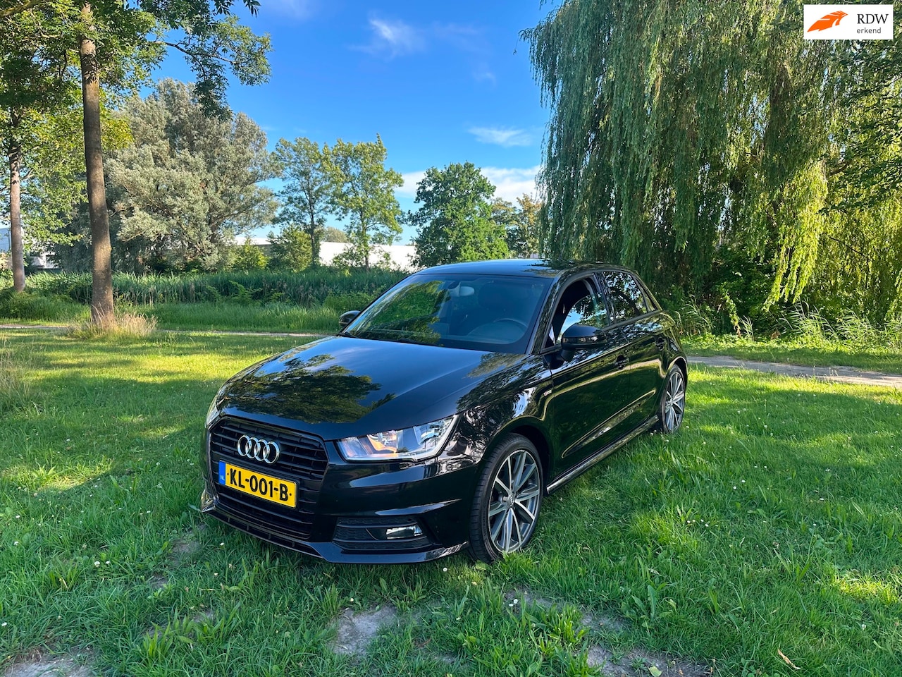 Audi A1 Sportback - 1.0 TFSI SLine Airco Navi Cruise - AutoWereld.nl
