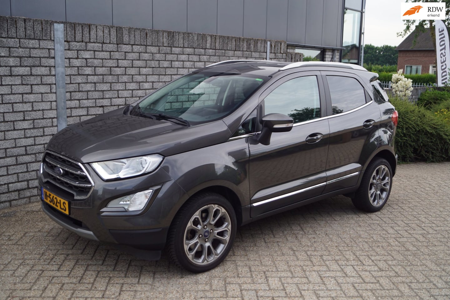 Ford EcoSport - 1.0 EcoBoost Titanium Autom Half Leder Stoel/Stuurverw Navi Camera Clima Cruise 2x PDC App - AutoWereld.nl