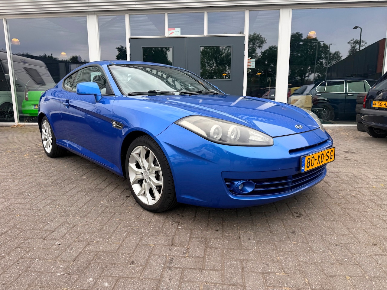 Hyundai Coupé - 2.0i CVVT Dynamic/Eerste eigenaar/Stoelverwarming/Lm Velgen. - AutoWereld.nl