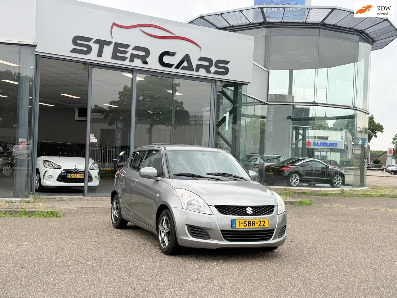 Suzuki Swift - 1.2 Comfort EASSS|Airco|Stoelverwarming|Trekhaak|APK| - AutoWereld.nl