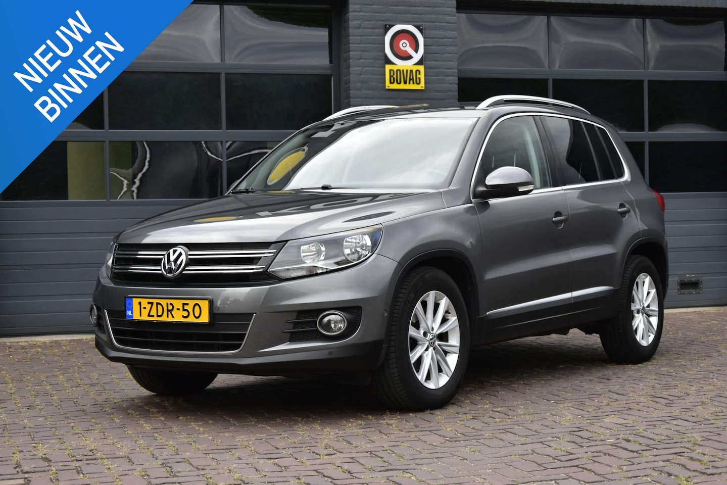 Volkswagen Tiguan - 1.4 TSI Sport & Style - AutoWereld.nl