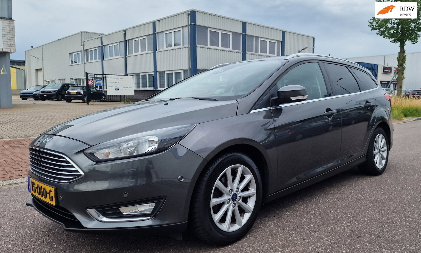 Ford Focus Wagon - 1.0 Titanium NAVI PSENSOR TREKHAAK CRUISE 2 X SLEUTELS - AutoWereld.nl