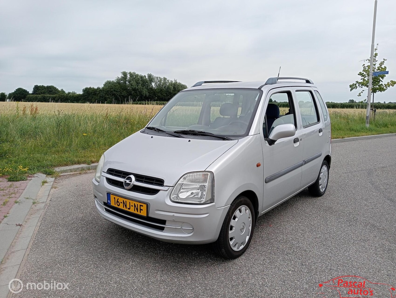 Opel Agila - 1.2-16V Enjoy airco nw apk hoge instap - AutoWereld.nl